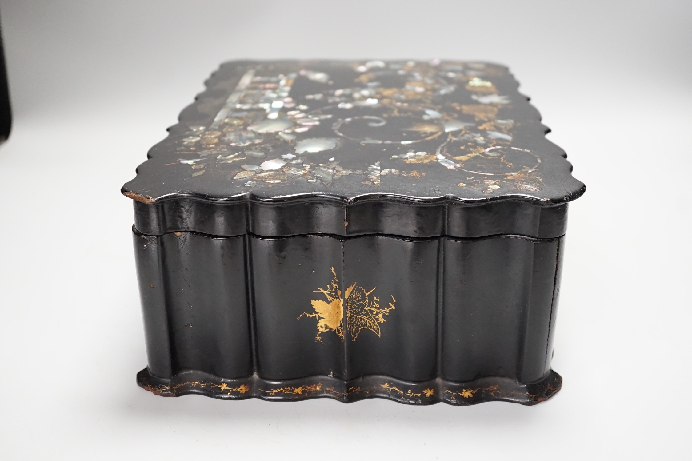 A Victorian papier mache workbox and contents, 32cm